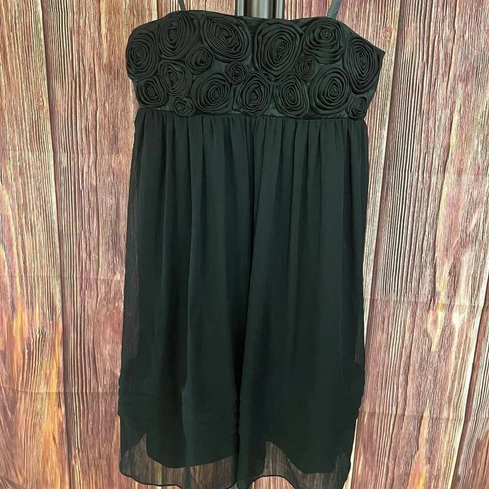Black strapless dress by BCBG Paris in a size 4